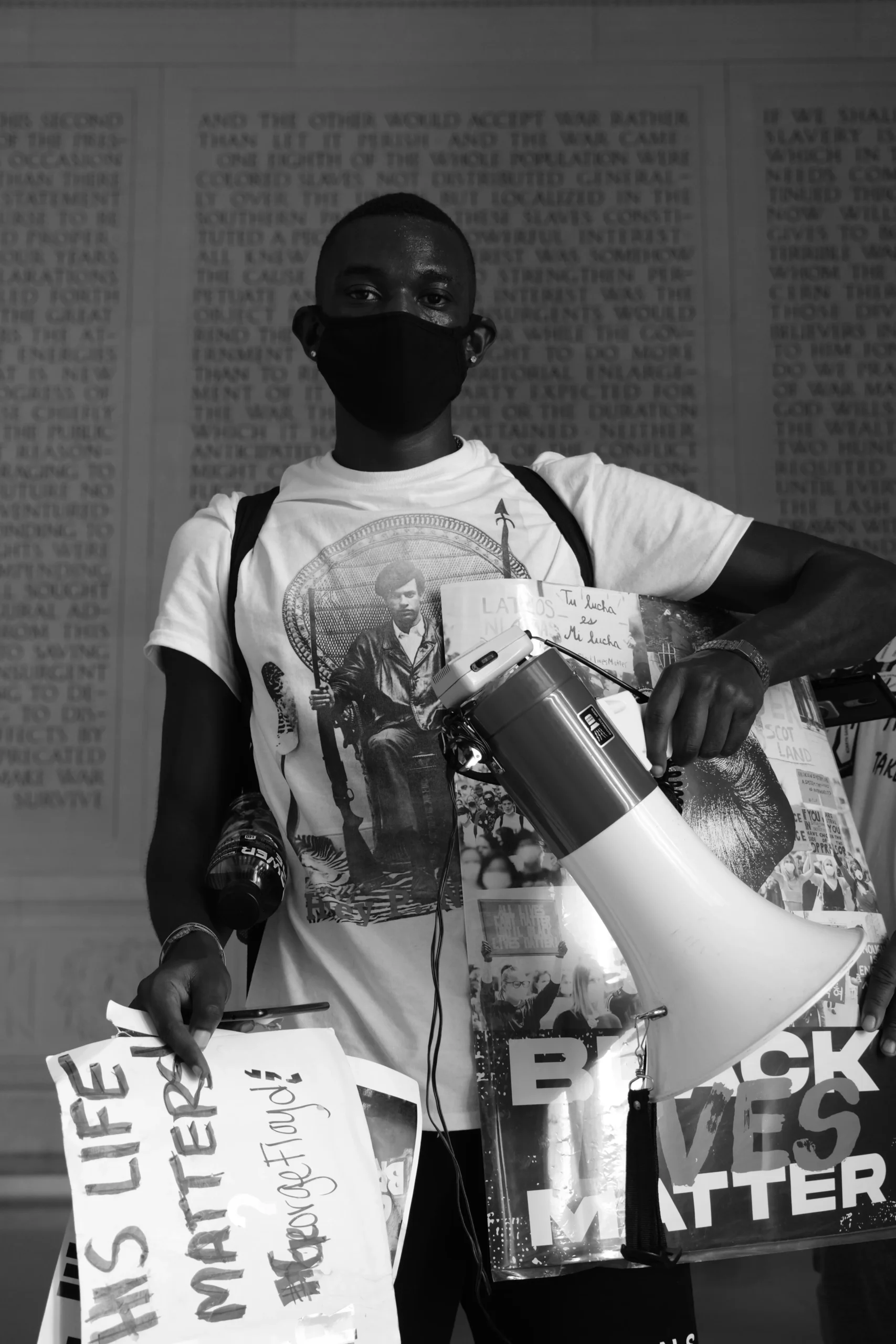 Photograph of a young BLM protester by Chris Cook